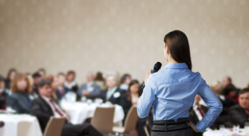 a speaker at a business event