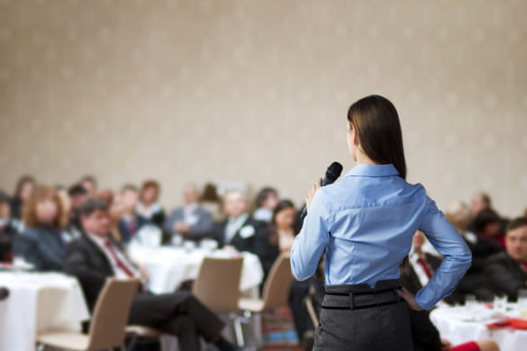 a speaker giving a talk at a business event